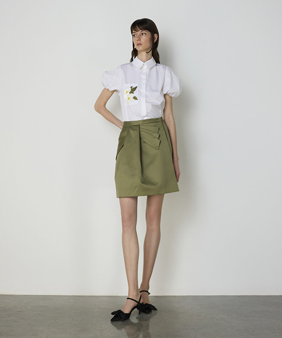 Asimetrik fiyonklu mini etek